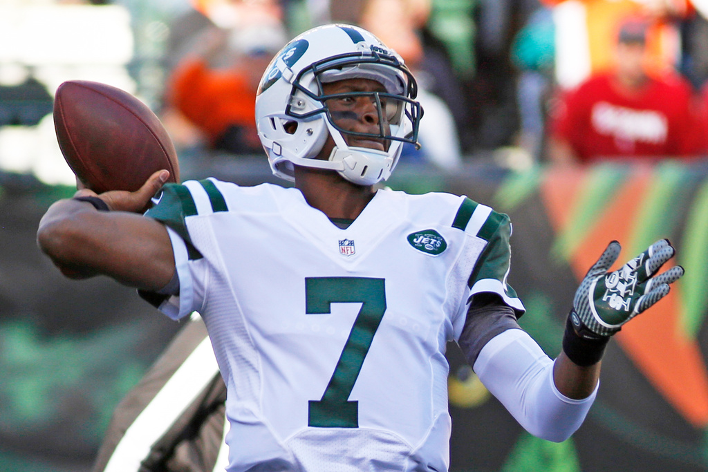 FILE - New York Jets quarterback Geno Smith passes against the Cincinnati Bengals in the first half of an NFL football game, Oct. 27, 2013, in Cincinnati. (AP Photo/David Kohl, File)