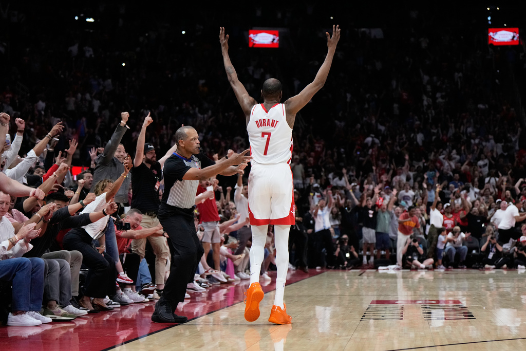 Houston Rockets forward Kevin Durant (7) reacts after winning against the Miami Heat in an NBA basketball game in Houston, Saturday, March 21, 2026. (AP Photo/Ashley Landis)