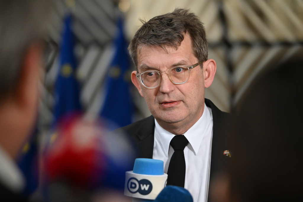 FILE - Denmark's Defense Minister Troels Lund Poulsen speaks with the media as he arrives for a meeting of European Union defense ministers at the European Council building in Brussels, Feb. 11, 2026. (AP Photo/Harry Nakos, File)