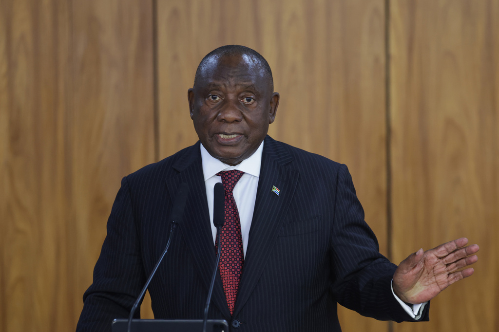 FILE - South Africa's President Cyril Ramaphosa speaks with journalists after meeting with Brazilian President Luiz Inacio Lula da Silva at Planalto Palace in Brasilia, Brazil, on, March 9, 2026. (AP Photo/Luis Nova, FILE)