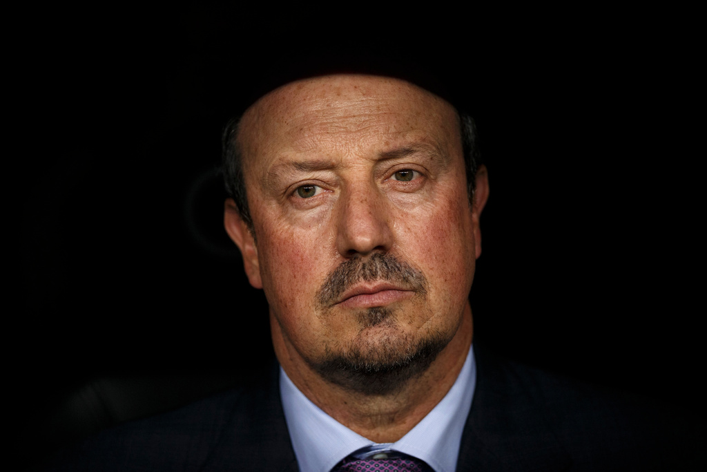 FILE -Real Madrid's head coach Rafa Benitez sits on the bench moments before the Santiago Bernabeu trophy soccer match between Real Madrid and Galatasaray at the Santiago Bernabeu stadium, in Madrid, Aug. 18, 2015. (AP Photo/Daniel Ochoa de Olza, File)