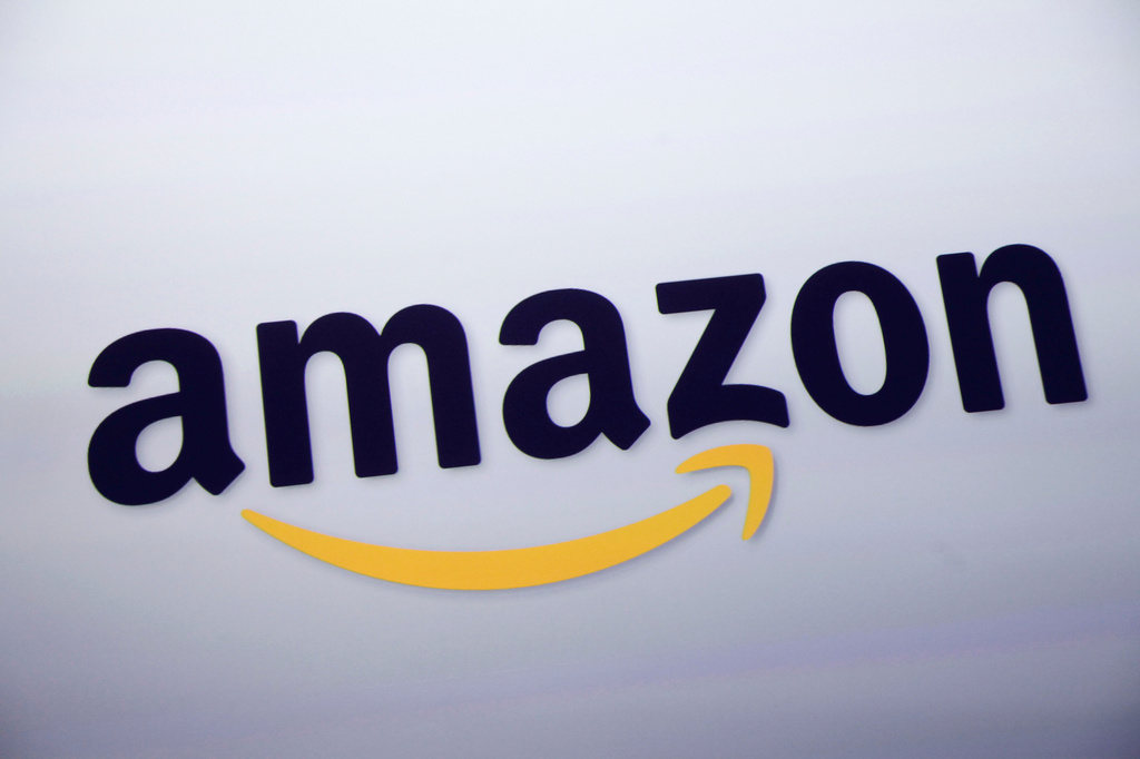 FILE - The Amazon logo is displayed at a news conference, Sept. 28, 2011, in New York. (AP Photo/Mark Lennihan, File)