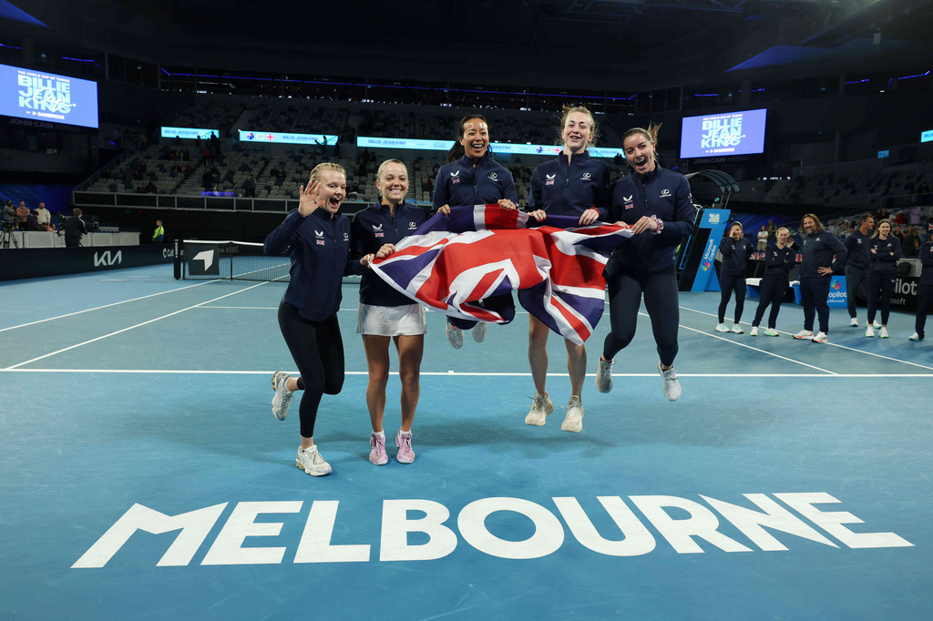 British Billy Jean Cup tennis players Harriet Dart, Katie Swan, Anne Keothavong, Mika Stojsavljevic and Jodie Anna Burrage celebrate, Saturday, April 11, 2026, after defeating Australia in Melbourne, Saturday, April 11, 2026. (Con Chronis/AAP Image via AP)
