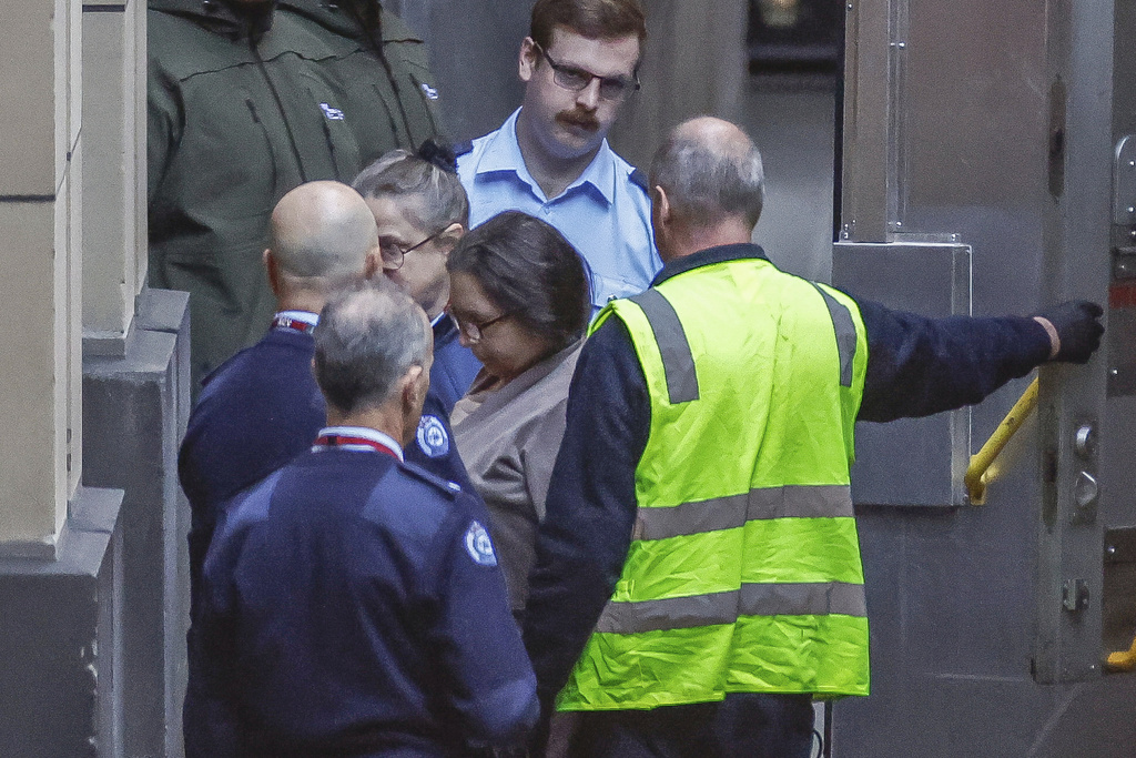 Convicted killer Erin Patterson, center, arrives at the Supreme Court of Victoria for sentencing in Melbourne, Australia, Monday, Sept. 8, 2025. (Jason South/The Age, Pool Photo via AP)