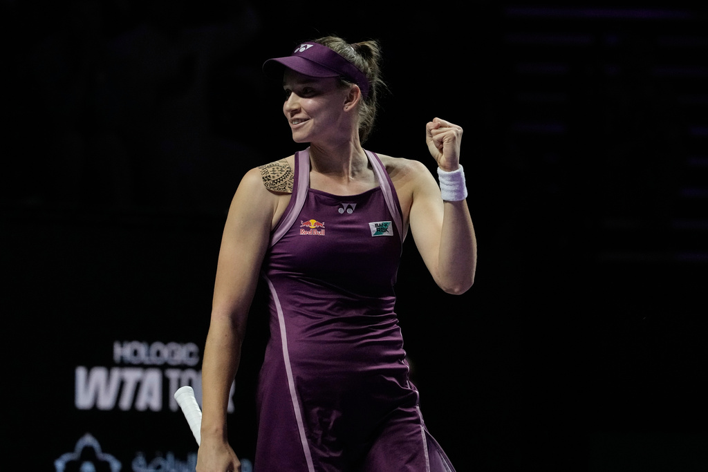 Elena Rybakina of Kazakhstan celebrates after defeating Aryna Sabalenka of Belarus in the women's final singles match of the WTA finals in Riyadh, Saudi Arabia, Saturday, Nov. 8, 2025. (AP Photo/ Fatima Shbair)