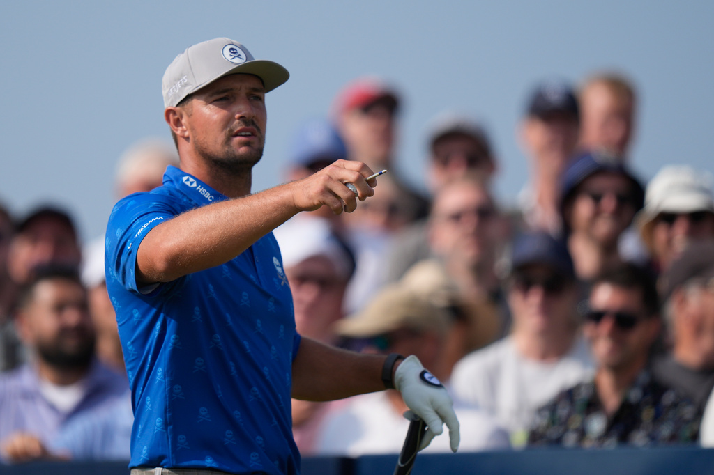 Bryson DeChambeau of the United States looks down the 9th fairway from the tee as he prepares to play during the second day of the British Open Golf championships at Royal Birkdale golf club, in Southport, England, Friday, July 17, 2026. (AP Photo/David Goldman)