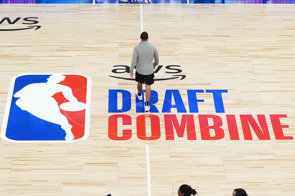 Draft Combine logo is displayed on the court during the NBA basketball draft combine in Chicago, Monday, May 11, 2026. (AP Photo/Nam Y. Huh)