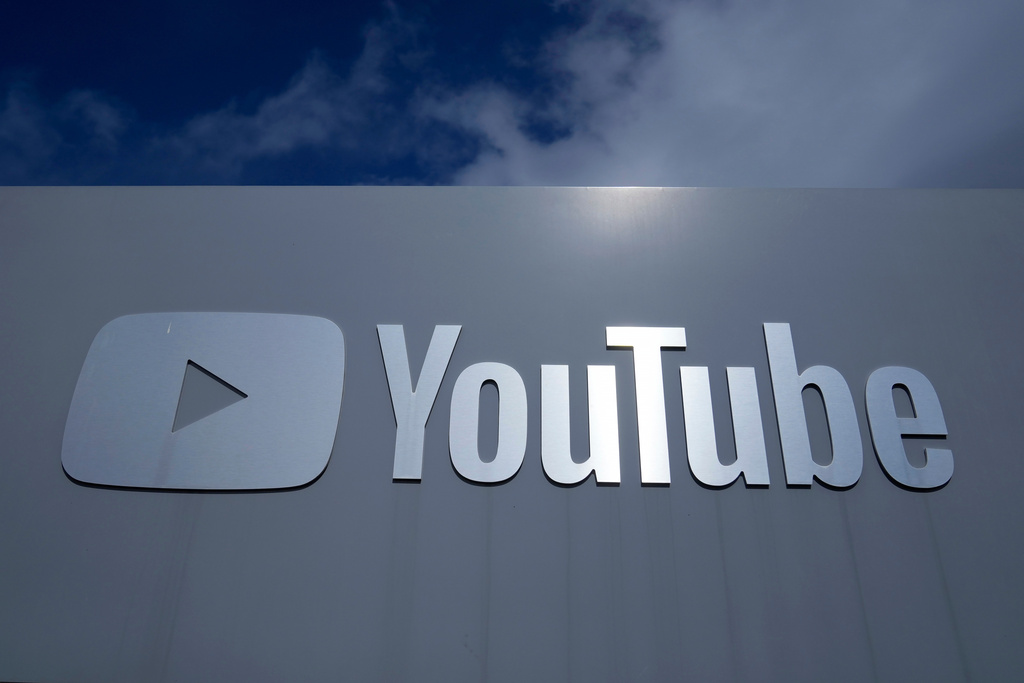 FILE - A YouTube sign is shown near the company's headquarters in San Bruno, Calif., Wednesday, March 12, 2025. (AP Photo/Jeff Chiu, file)