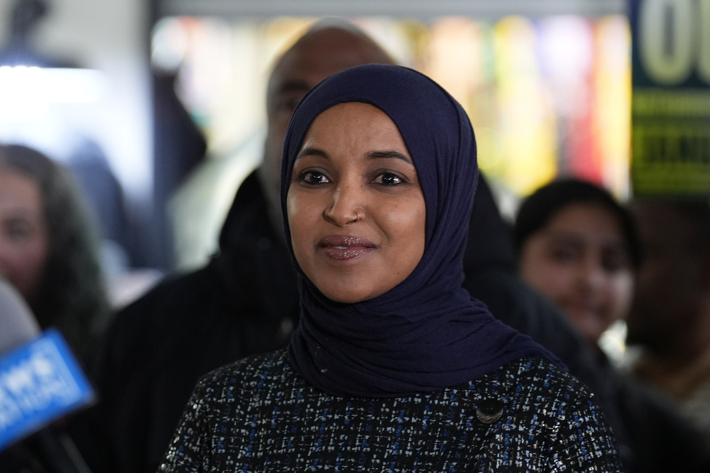 Rep. Ilhan Omar, D-Minn., stands during a press conference on Wednesday, Jan. 28, 2026, in Minneapolis. (AP Photo/Adam Gray)