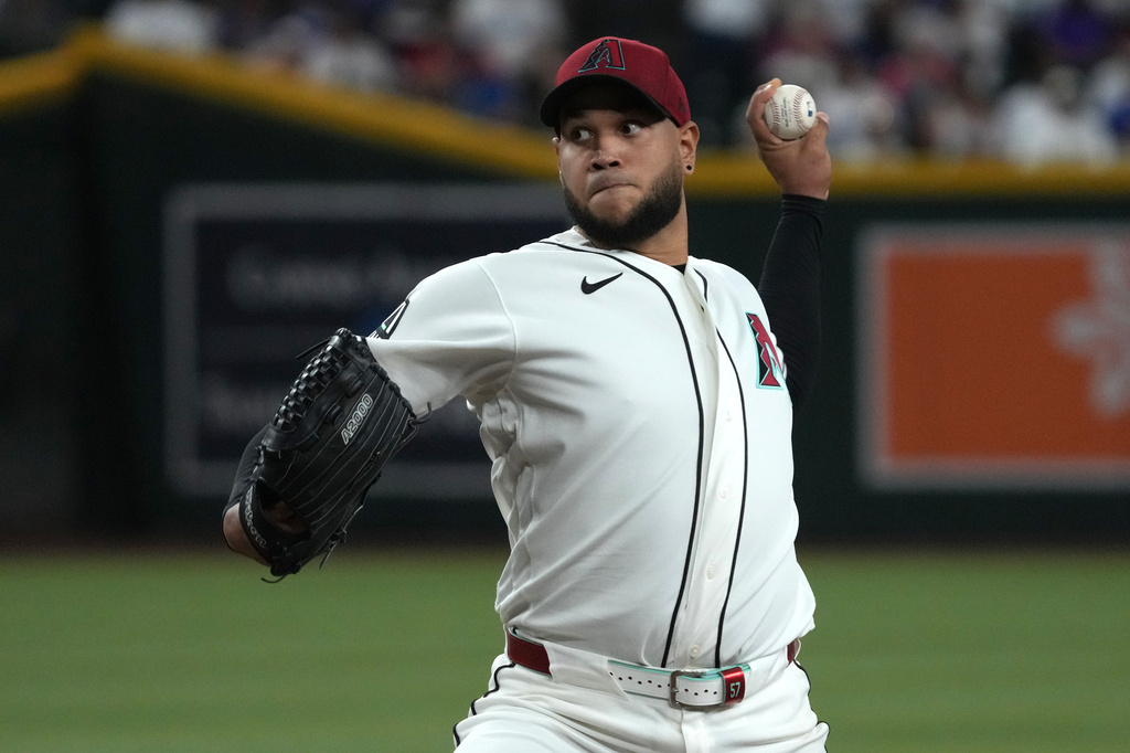 Arizona Diamondbacks pitcher Eduardo Rodriguez throws against the Los Angeles Dodgers in the first inning of a baseball game, Monday, June 1, 2026, in Phoenix. (AP Photo/Rick Scuteri)