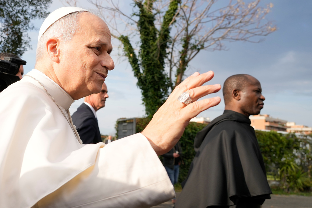 Pope Leo XIV visits the parish complex of the Santa Maria della Presentazione on the outskirts of Rome, Sunday, March 8, 2026. (AP Photo/Gregorio Borgia)