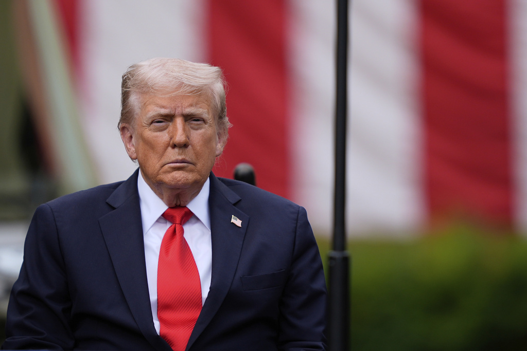 President Donald Trump listens as names are read as he attends a ceremony at the Pentagon to commemorate the 24rd anniversary of the 9/11 attacks, Thursday, Sept. 11, 2025, in Washington. (AP Photo/Julia Demaree Nikhinson)