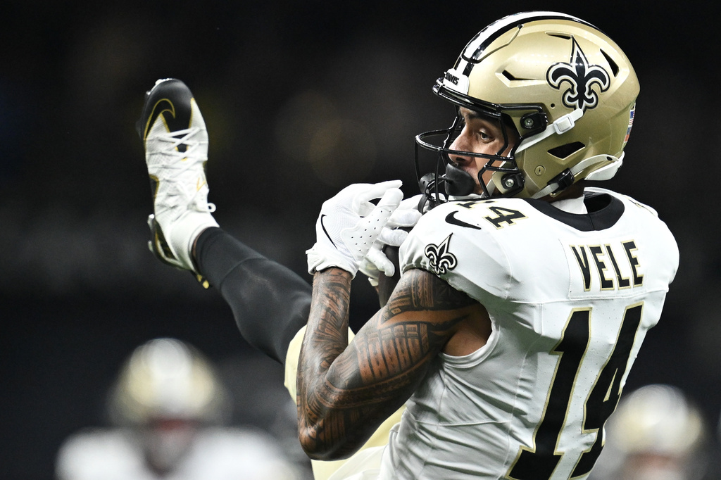 New Orleans Saints wide receiver Devaughn Vele (14) catches a pass against the Atlanta Falcons during the second half of an NFL football game in New Orleans, Monday, Oct. 5, 2026. (AP Photo/Ella Hall)