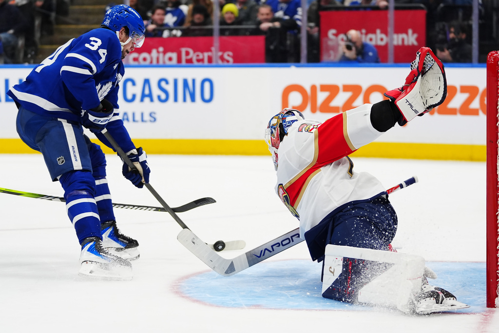 Toronto Maple Leafs' Auston Matthews (34) is stopped by Florida Panthers goaltender Sergei Bobrovsky (72) during the second period of an NHL hockey game in Toronto, Tuesday, Jan. 6, 2026. (Frank Gunn/The Canadian Press via AP)
