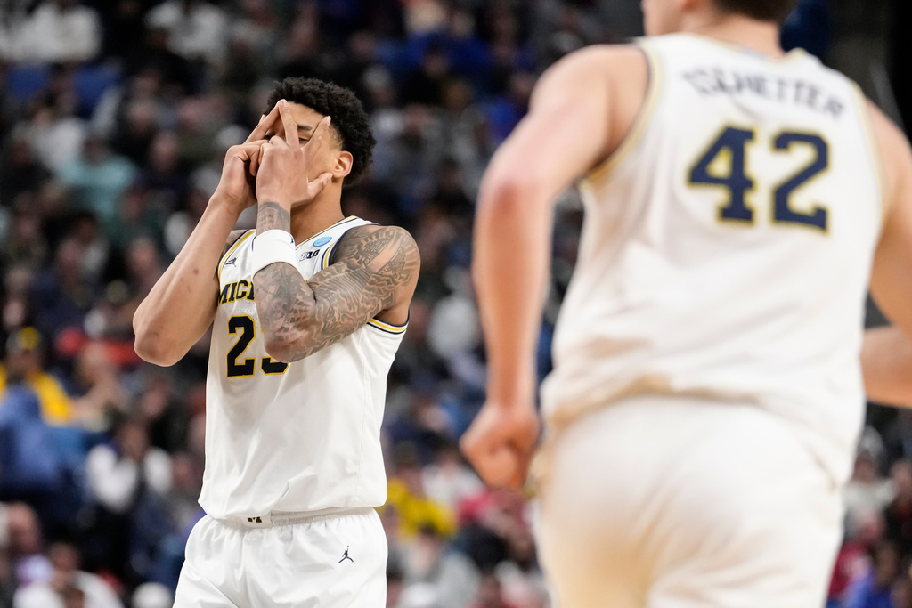 Michigan forward Yaxel Lendeborg (23) reacts after a 3-point basket against Saint Louis during the second half in the second round of the NCAA college basketball tournament, Saturday, March 21, 2026, in Buffalo, N.Y. (AP Photo/Yuki Iwamura)