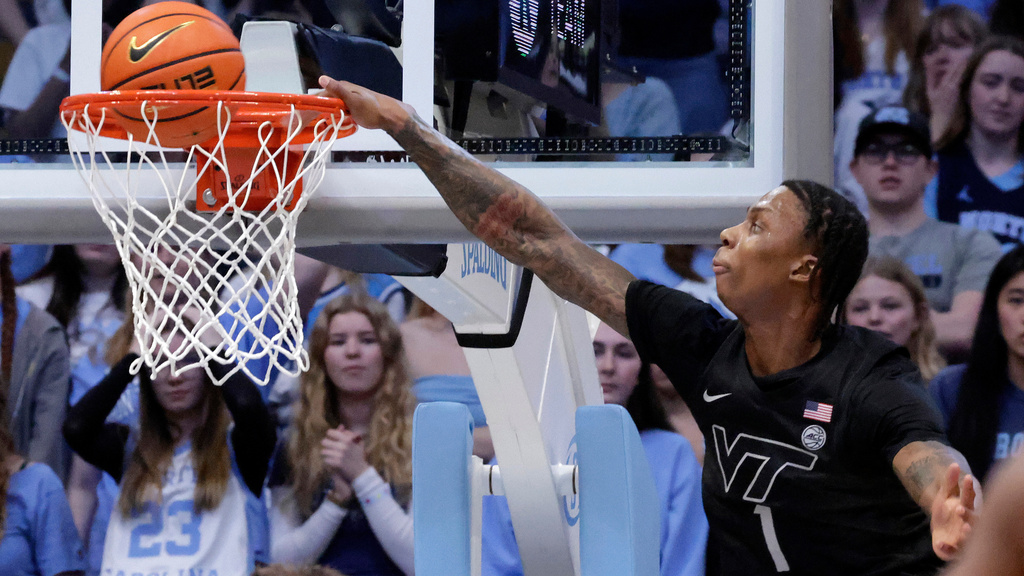 Virginia Tech forward Tobi Lawal dunks against North Carolina during the first half of an NCAA college basketball game Saturday, Feb. 28, 2026, in Chapel Hill, N.C. (AP Photo/Chris Seward)