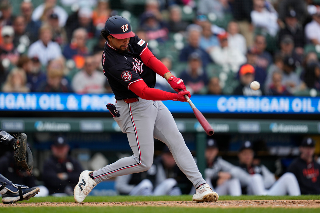 Washington Nationals' Yohandy Morales hits a two-run home run against the Detroit Tigers during the sixth inning of a baseball game Wednesday, Sept. 23, 2026, in Detroit. (AP Photo/Paul Sancya)
