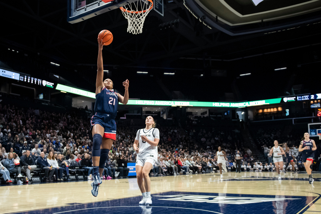UConn forward Sarah Strong (21) shoots during the first quarter of an NCAA college basketball game against Xavier, Sunday, Nov. 30, 2025, in Cincinnati. (AP Photo/Tanner Pearson)