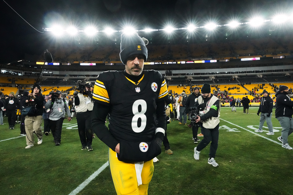 Pittsburgh Steelers quarterback Aaron Rodgers (8) leaves the field after an NFL wild-card playoff football game against the Houston Texans, Monday, Jan. 12, 2026, in Pittsburgh. (AP Photo/Gene J. Puskar)