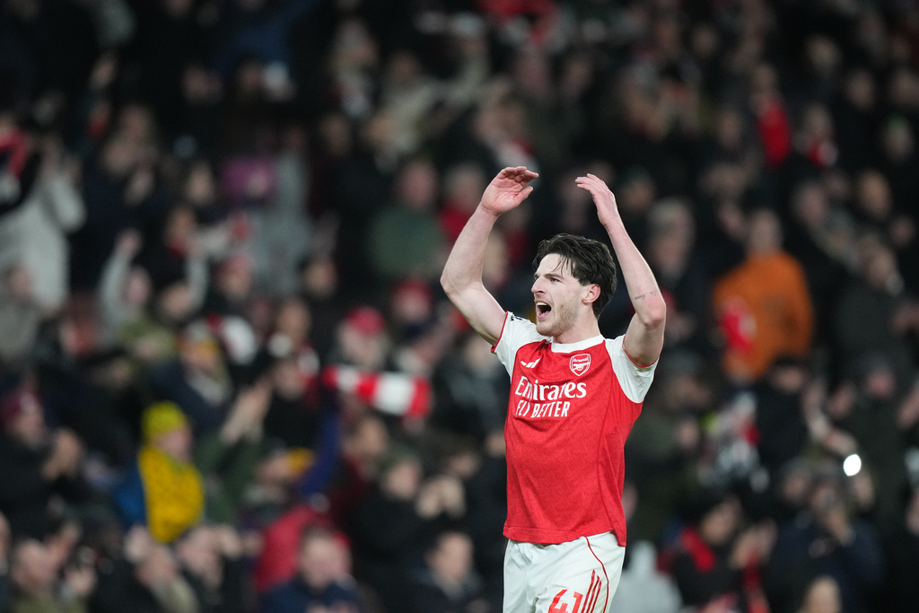 Arsenal's Declan Rice celebrates after a Premier League soccer match between Arsenal and Tottenham in London, Sunday, Nov. 23, 2025. (AP Photo/Frank Augstein)