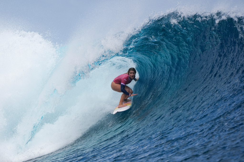 FILE - Caroline Marks, of the United States, surfs during the semifinal round of the surfing competition at the 2024 Summer Olympics, Monday, Aug. 5, 2024, in Teahupo'o, Tahiti. (AP Photo/Gregory Bull, File)
