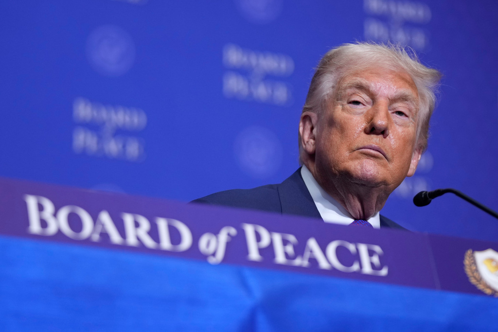 President Donald Trumpl listens during a Board of Peace meeting at the U.S. Institute of Peace, Thursday, Feb. 19, 2026, in Washington. (AP Photo/Mark Schiefelbein)