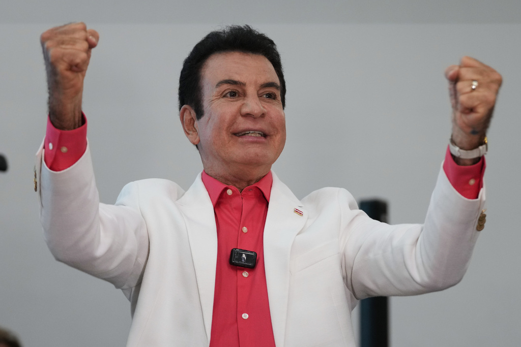 Presidential candidate Salvador Nasralla, of the Liberal Party, celebrates after the first official preliminary results were announced during general elections in Tegucigalpa, Honduras, Sunday, Nov. 30, 2025. (AP Photo/Moises Castillo)