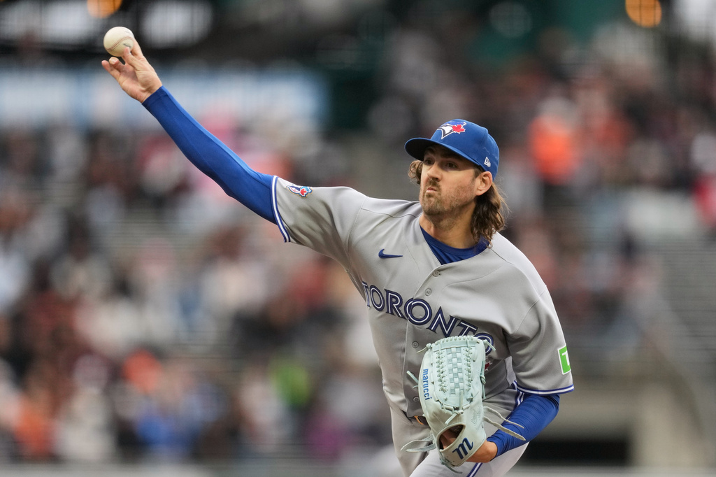 Toronto Blue Jays pitcher Kevin Gausman throws against the San Francisco Giants during the first inning of a baseball game Monday, July 6, 2026, in San Francisco. (AP Photo/Jeff Chiu)
