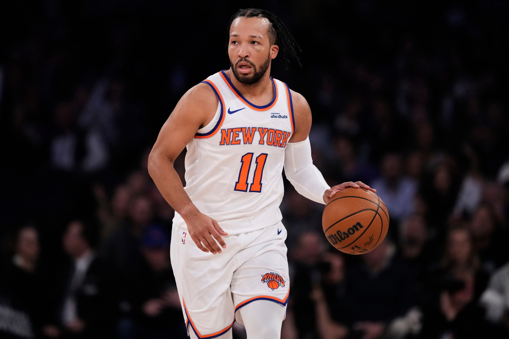 New York Knicks' Jalen Brunson (11) looks to pass during the first half of an NBA basketball game against the Orlando Magic Wednesday, Nov. 12, 2025, in New York. (AP Photo/Frank Franklin II)