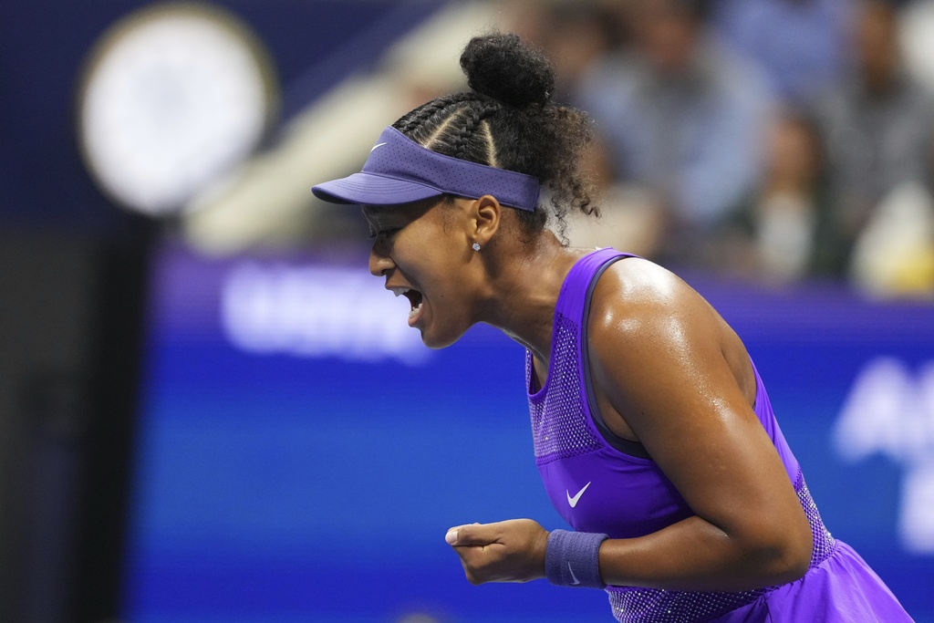 Naomi Osaka, of Japan reacts against Amanda Anisimova, of the United States, during the women's singles semifinals of the U.S. Open tennis championships, Thursday, Sept. 4, 2025, in New York. (AP Photo/Kirsty Wigglesworth)