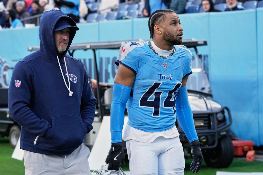 Tennessee Titans safety Mike Brown (44) leaves the field after he was ejected from an NFL football game between the Tennessee Titans and the Jacksonville Jaguars Sunday, Nov. 30, 2025, in Nashville, Tenn. (AP Photo/George Walker IV)