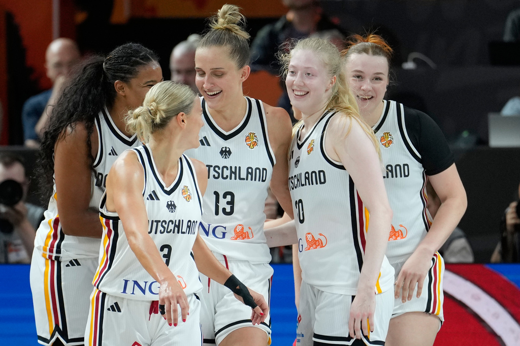 German players react during the Women's Basketball World Cup match between Germany and Japan in Berlin, Saturday, Sept. 5, 2026. (AP Photo/Ebrahim Noroozi)