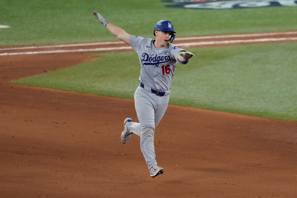 Los Angeles Dodgers' Will Smith celebrates his home run against the Toronto Blue Jays during the 11th inning in Game 7 of baseball's World Series, Sunday, Nov. 2, 2025, in Toronto. (AP Photo/Ashley Landis)