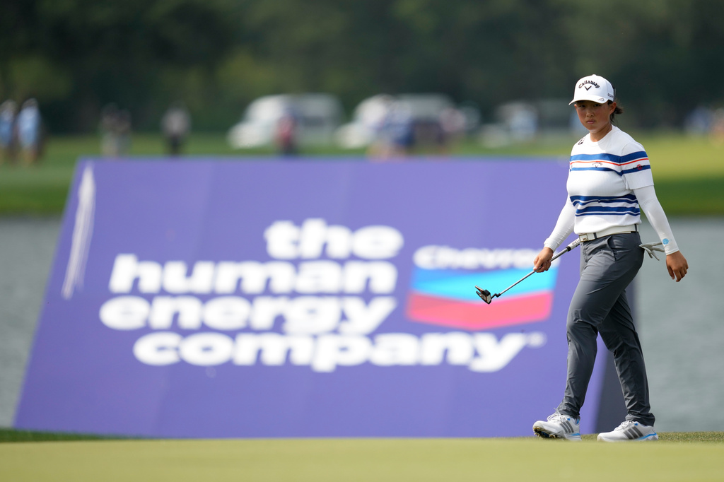 Ruoning Yin, of China, walks on the green on the 17th hole during the third round of the Chevron Championship LPGA golf tournament Saturday, April 25, 2026, in Houston. (AP Photo/Ashley Landis)