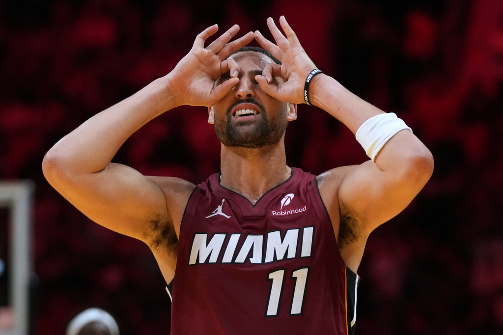 Miami Heat forward Klay Thompson (11) celebrates after scoring during the second half of an NBA Cup basketball game against the Indiana Pacers, Friday, Oct. 30, 2026, in Miami. (AP Photo/Lynne Sladky)