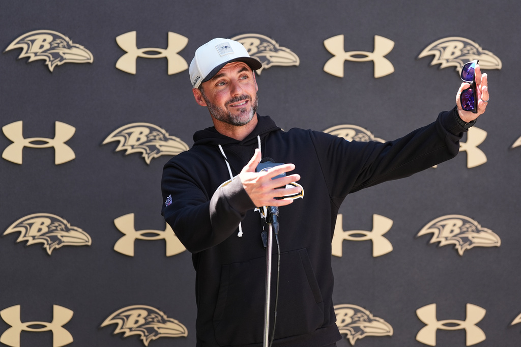 Baltimore Ravens head coach Jesse Minter speaks during a press conference at the team's NFL football training camp, Thursday, July 30, 2026, at the Under Armour Performance Center in Owings Mills, Md. (AP Photo/Stephanie Scarbrough)