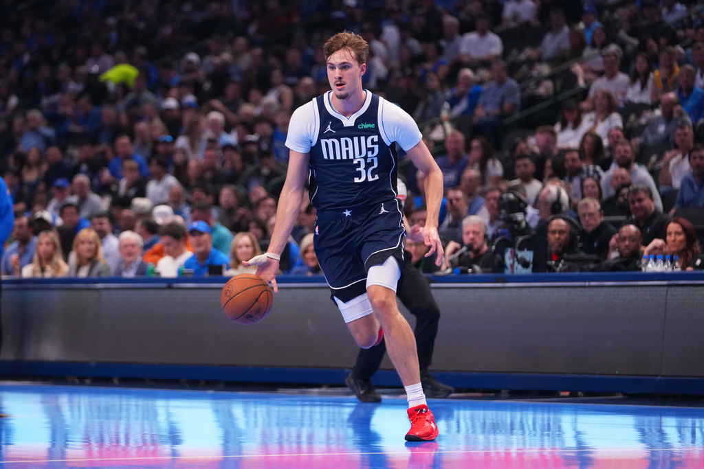 Dallas Mavericks forward Cooper Flagg drives to the basket against the Los Angeles Clippers during the first half of an NBA Cup basketball game Friday, Nov. 14, 2025, in Dallas. (AP Photo/Julio Cortez)