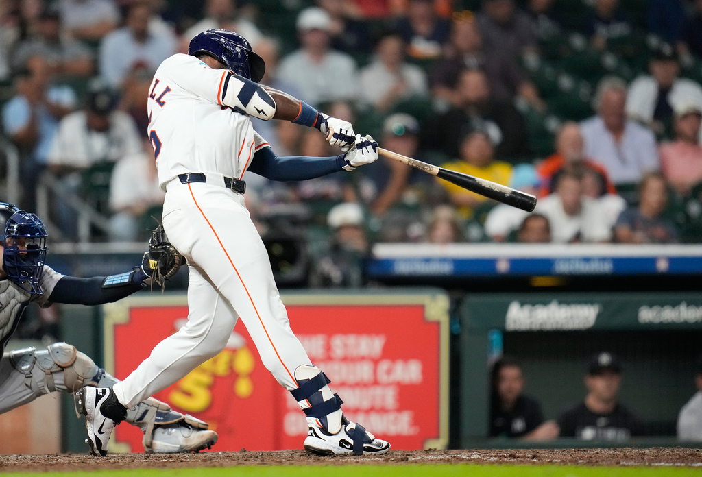 Houston Astros' Taylor Trammell hits a double off of New York Yankees relief pitcher David Bednar during the ninth inning of a baseball game Thursday, Sept. 4, 2025, in Houston. (AP Photo/Karen Warren)