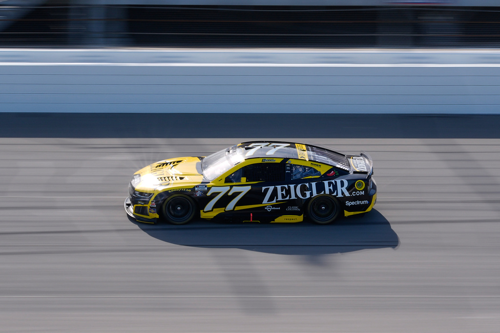 Carson Hocevar (77) drives during a NASCAR Cup Series auto race at Michigan International Speedway in Brooklyn, Mich., Sunday, June 7, 2026. (AP Photo/Paul Sancya)