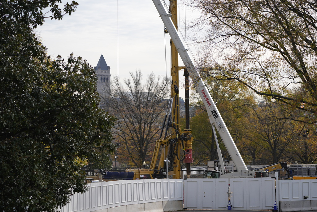 Construction of a new ballroom continues on the East Wing of the White House, Tuesday, Nov. 23, 2025, in Washington. (AP Photo/Alex Brandon)
