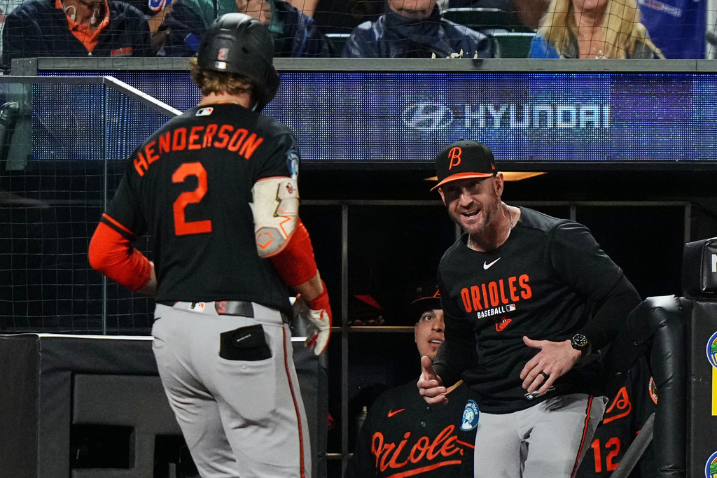 Baltimore Orioles manager Craig Albernaz greets Gunnar Henderson (2) after Henderson hit a home run during the eighth inning of a baseball game against the New York Mets Monday, Sept. 14, 2026, in New York. (AP Photo/Frank Franklin II)