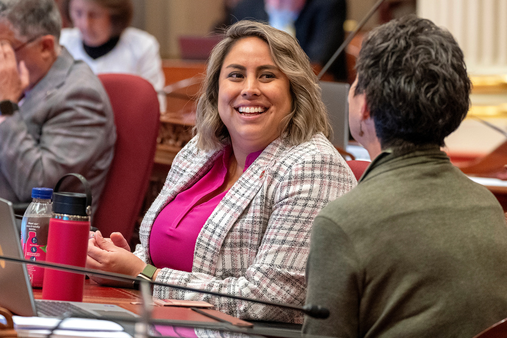 FILE - State Sen. Caroline Menjivar, D- San Fernando Valley, left, talks with fellow state Sen. Susan Talamantes Eggman, D-Stockton, at the Capitol in Sacramento, Calif., July 10, 2023. (AP Photo/Rich Pedroncelli, File)