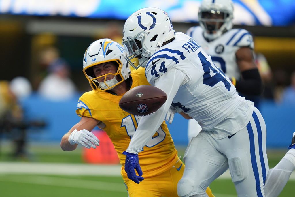 Indianapolis Colts outside linebacker Zaire Franklin (44) breaks up a pass to Los Angeles Chargers wide receiver Ladd McConkey (15) during the second half of an NFL football game Sunday, Oct. 19, 2025, in Inglewood, Calif. (AP Photo/Gregory Bull)