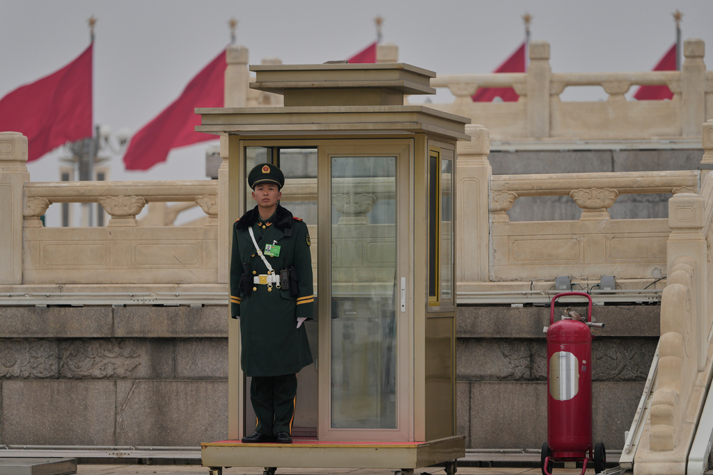 A Chinese paramilitary policeman stands guard on Tiananmen Square near the Great Hall of the People, in Beijing, China, Wednesday, March 4, 2026. (AP Photo/Ng Han Guan)