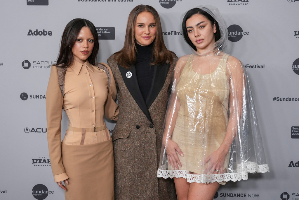 Jenna Ortega, from left, Natalie Portman, and Charli xcx attend the premiere of "The Gallerist" during the Sundance Film Festival on Saturday, Jan. 24, 2026, at Eccles Center in Park City, Utah. (AP Photo/Chris Pizzello)