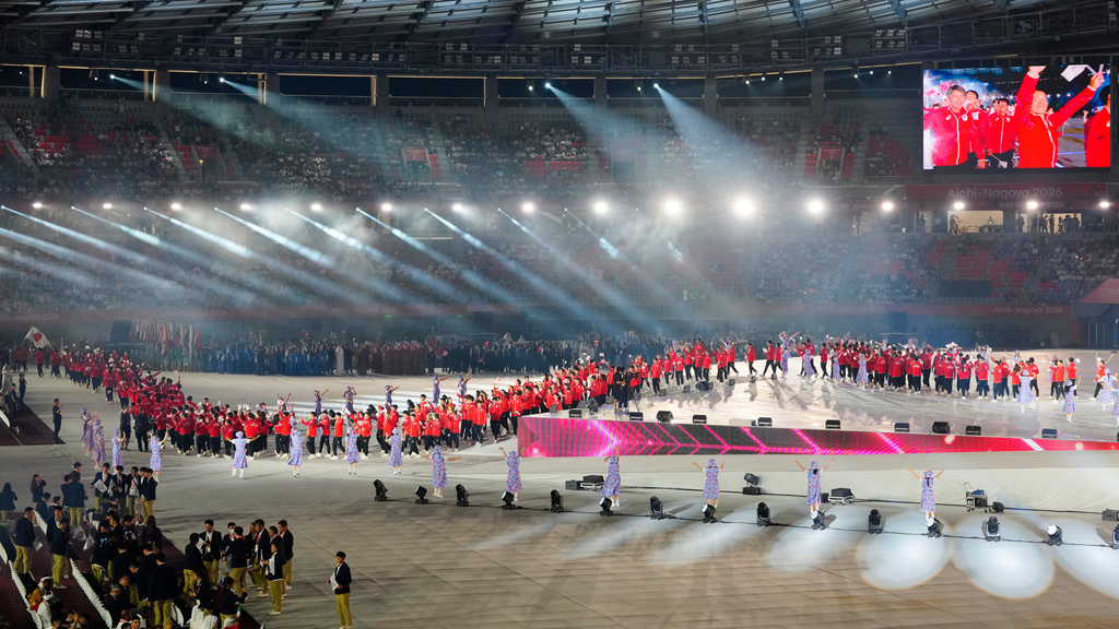 Japanese athletes march into the stadium during the opening ceremony for the Asian Games in Nagoya, Japan, Saturday, Sept. 19, 2026. (AP Photo/Eugene Hoshiko)