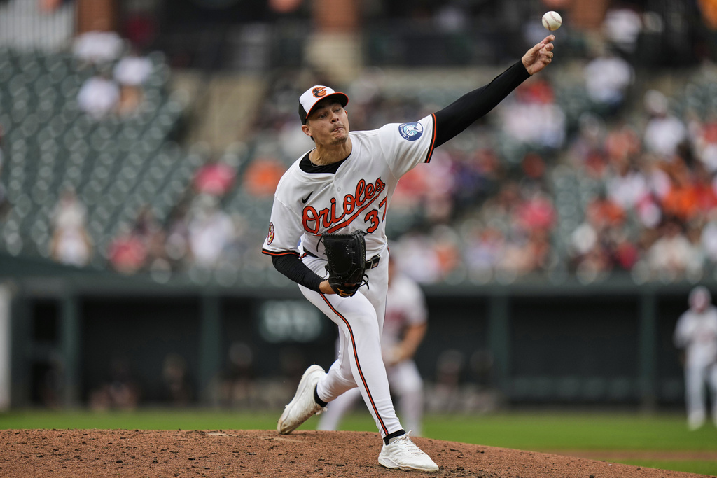 Baltimore Orioles starting pitcher Cade Povich (37) delivers during the third inning of a baseball game against the Boston Red Sox, Thursday, Aug. 28, 2025, in Baltimore. (AP Photo/Stephanie Scarbrough)
