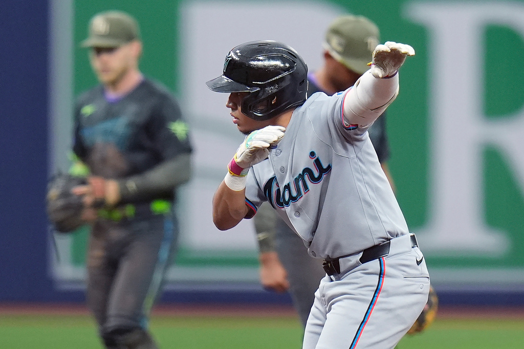 Miami Marlins' Javier Sanoja celebrates his RBI double off Tampa Bay Rays pitcher Bryan Baker during the ninth inning of a baseball game Saturday, May 16, 2026, in St. Petersburg, Fla. (AP Photo/Chris O'Meara)