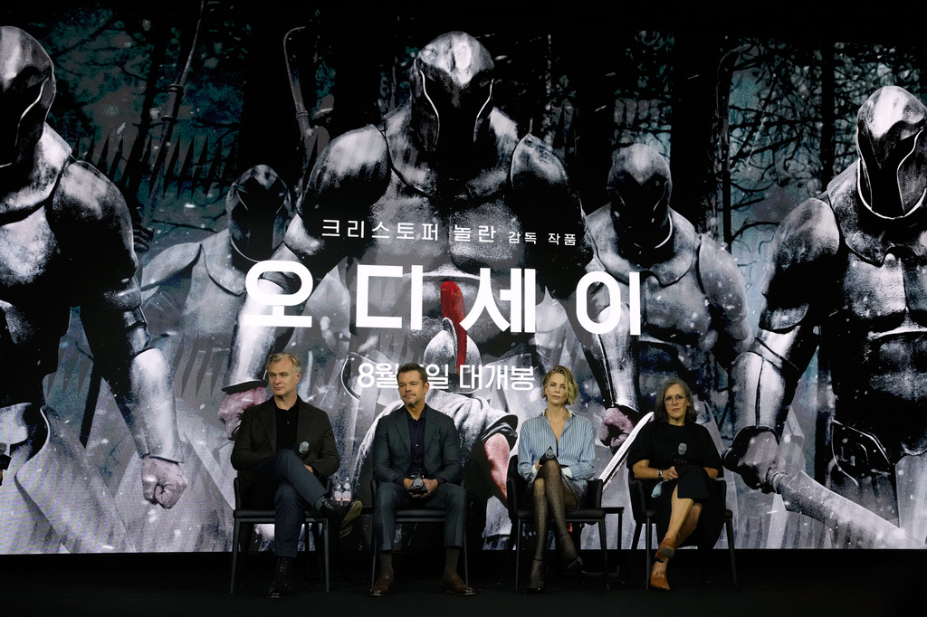 From right, producer Emma Thomas, Charlize Theron, Matt Damon and director Christopher Nolan attend a press conference to promote their latest movie "Odyssey" in Seoul, South Korea, Monday, Aug. 3, 2026. (AP Photo/Ahn Young-joon)