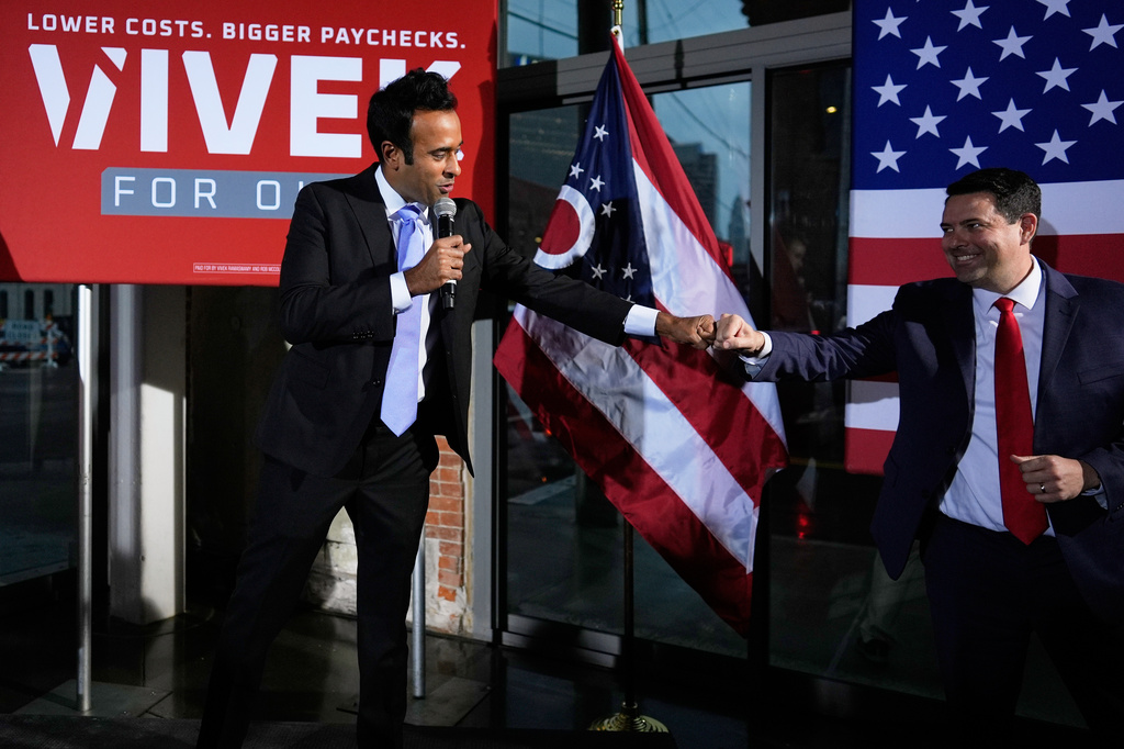 Republican Ohio gubernatorial candidate Vivek Ramaswamy, left, fist-bumps state Senate President Rob McColley during a watch party at the Spruce St. Sporting sports bar after winning the party?s nomination for governor Tuesday, May 5, 2026, in Columbus. (AP Photo/Carolyn Kaster)